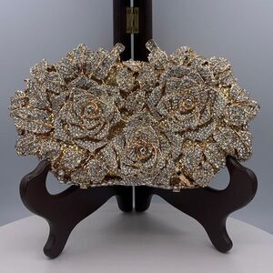 New, no tags, gold hard/clamshell/hand bag/clutch, fully embellished, crystals